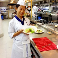 Chef Pui plating a dish